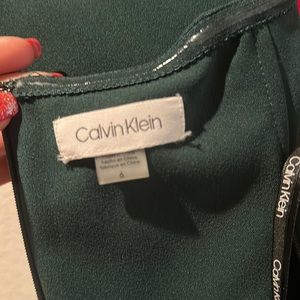 Calvin Klein elegant off shoulder mermaid evening gown.